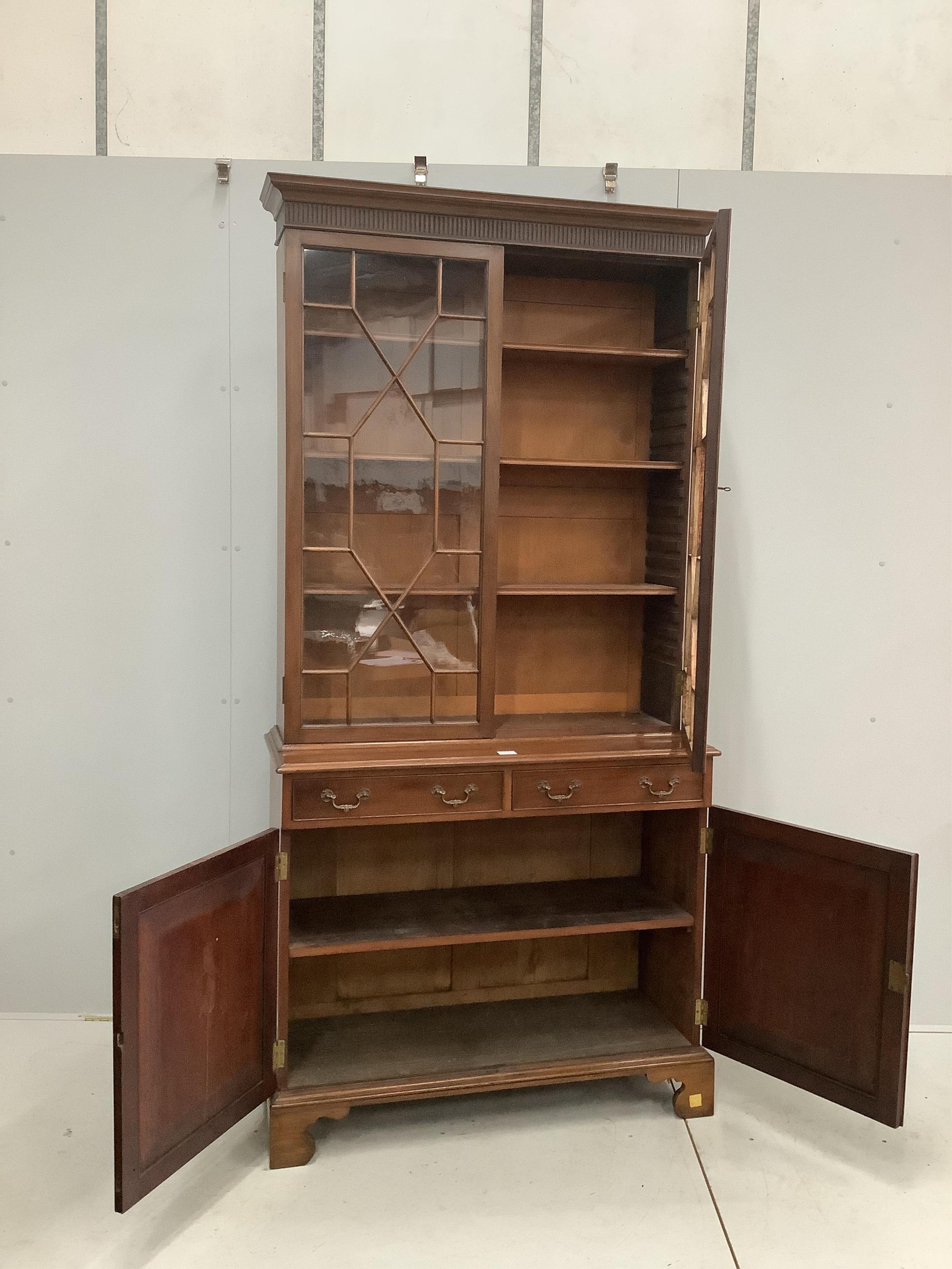 A George III style mahogany bookcase, width 105cm, depth 40cm, height 217cm. Condition - good